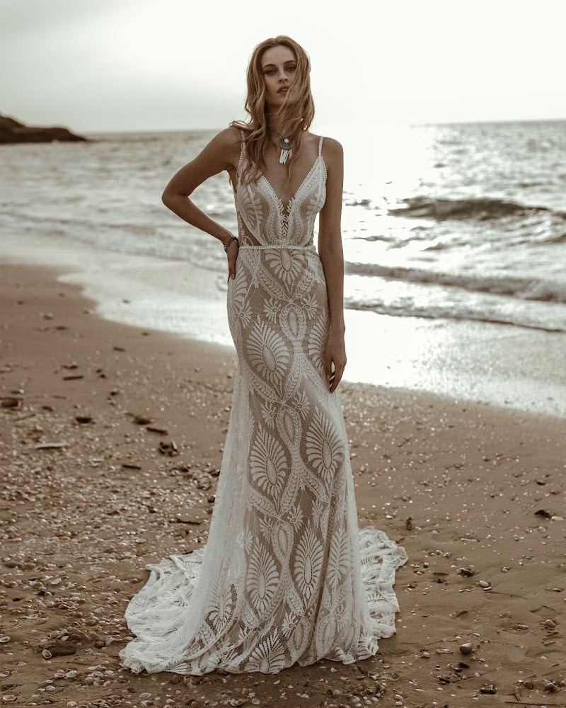 Intricate lace beach bridal gown