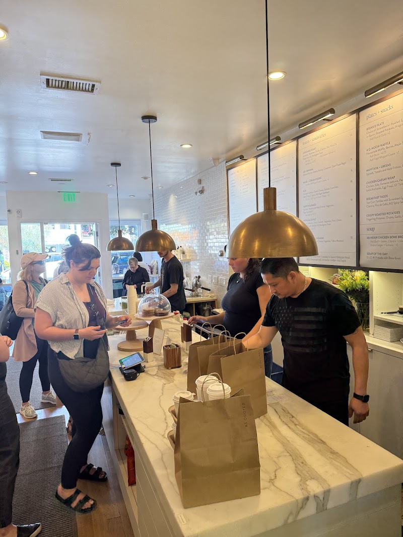 Bright café, busy counter