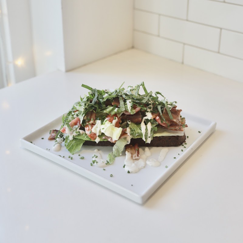 Open-faced toast, fresh greens