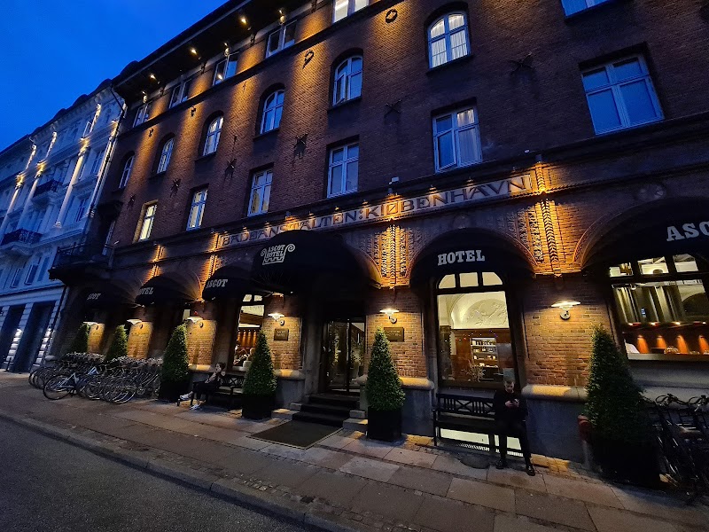 Historic façade lit at dusk
