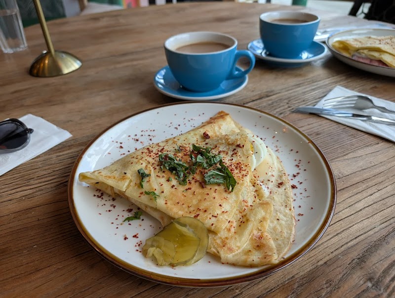 Savory crepe, coffee alongside