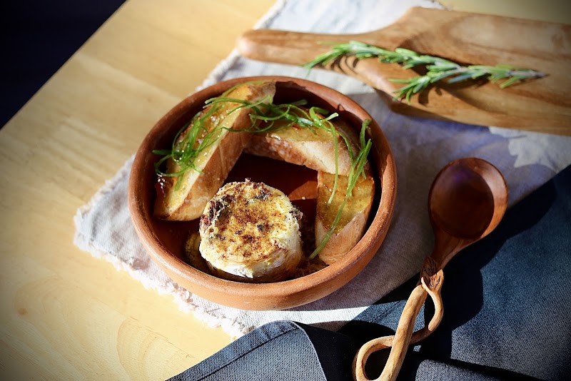 Baked cheese with toasted bread