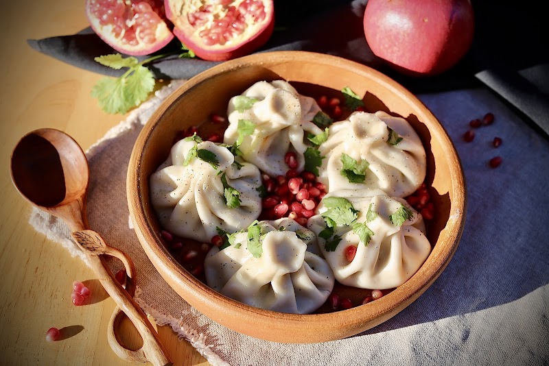 Khinkali with pomegranate garnish