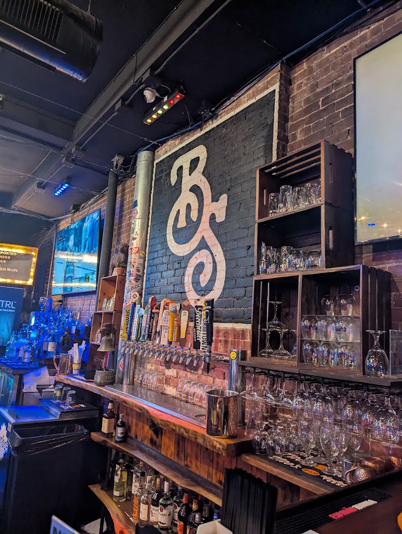 Behind the bar, ready