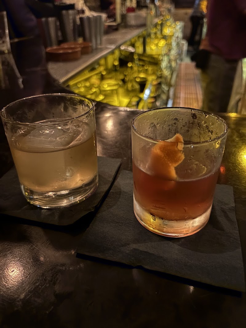 Handcrafted drinks, candlelit bar