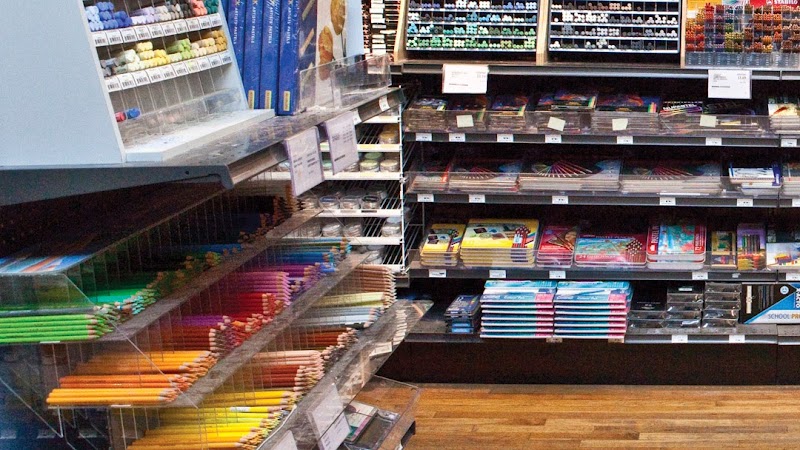 Colorful pencils, stacked notebooks