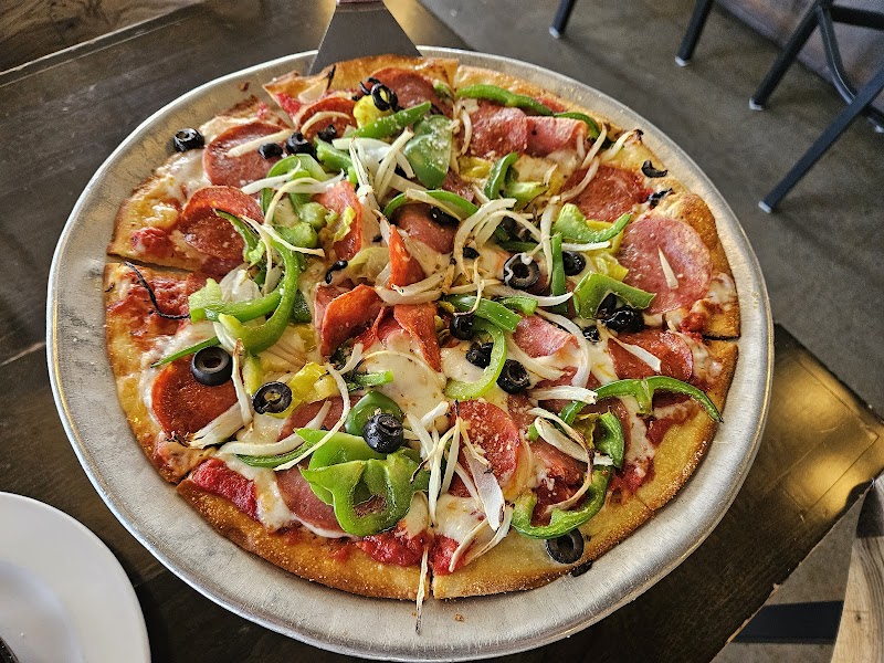 Loaded thin crust pizza