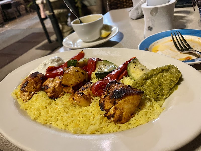 Chicken kebab over saffron rice