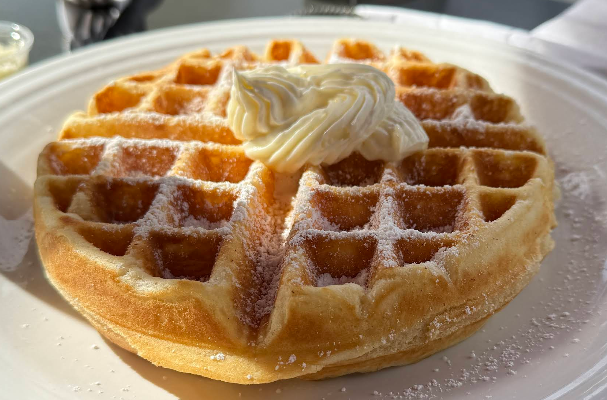 Golden waffle, powdered sugar