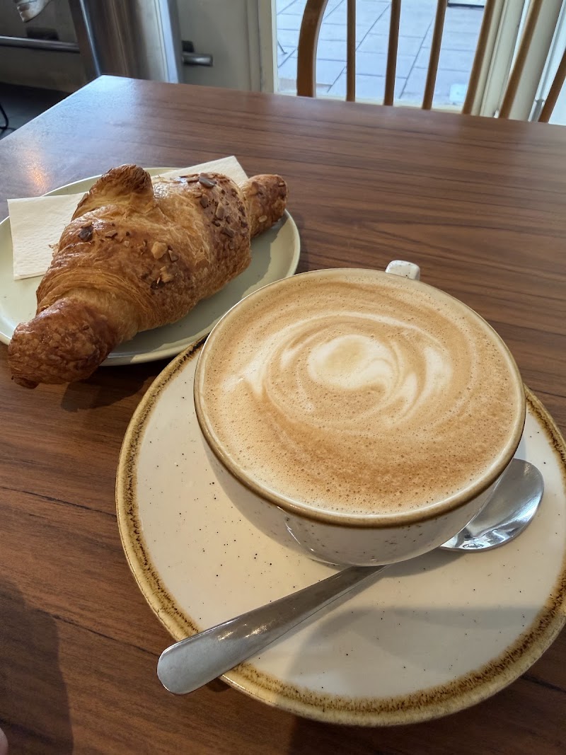 Cappuccino and almond croissant