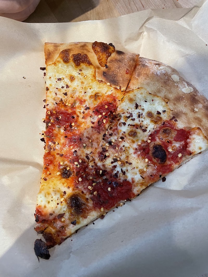 Classic cheese pizza slice
