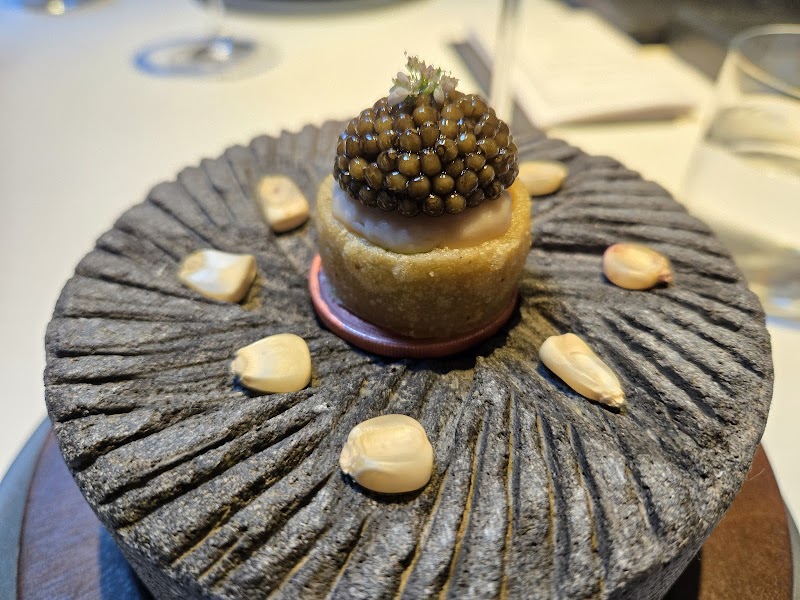 Caviar atop stone plate