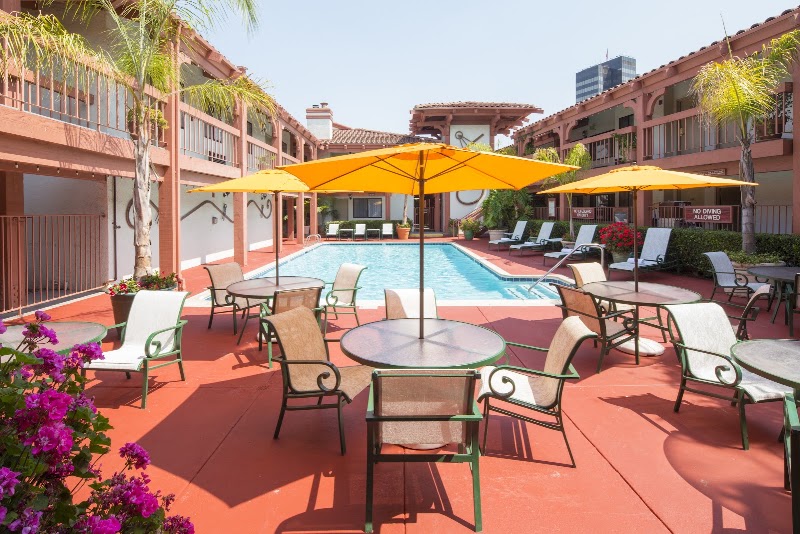 Sunny poolside courtyard retreat