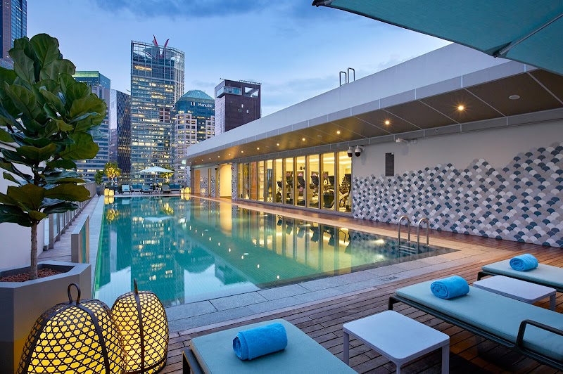 Rooftop pool, city lights