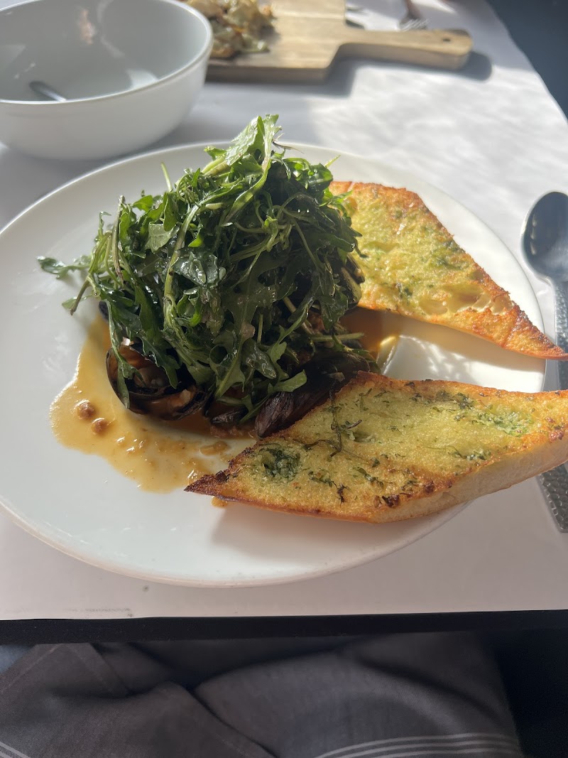 Mussels, arugula, herb crostini