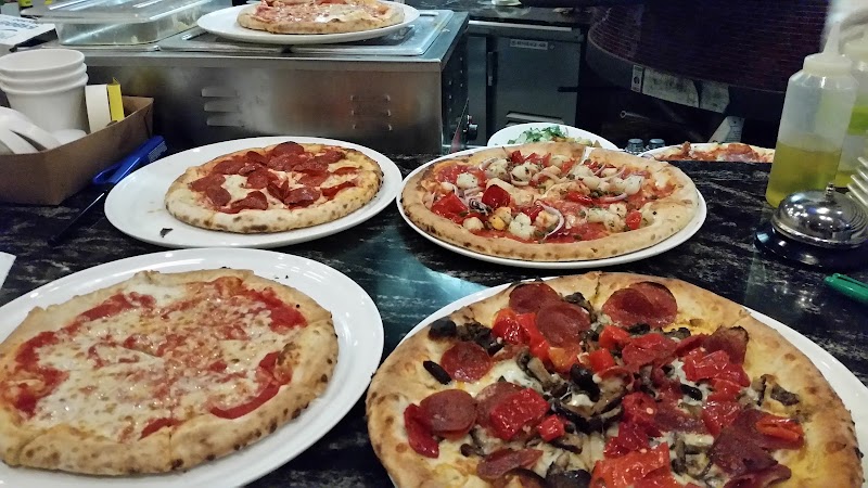 Fresh pizzas from the kitchen