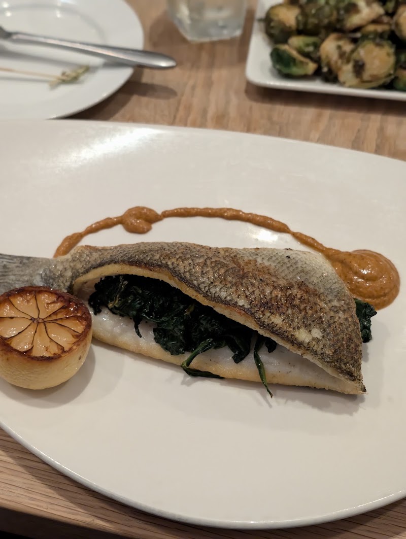 Crispy branzino, wilted greens