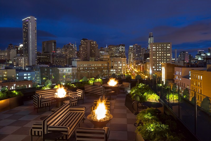 City skyline, fire pits glowing