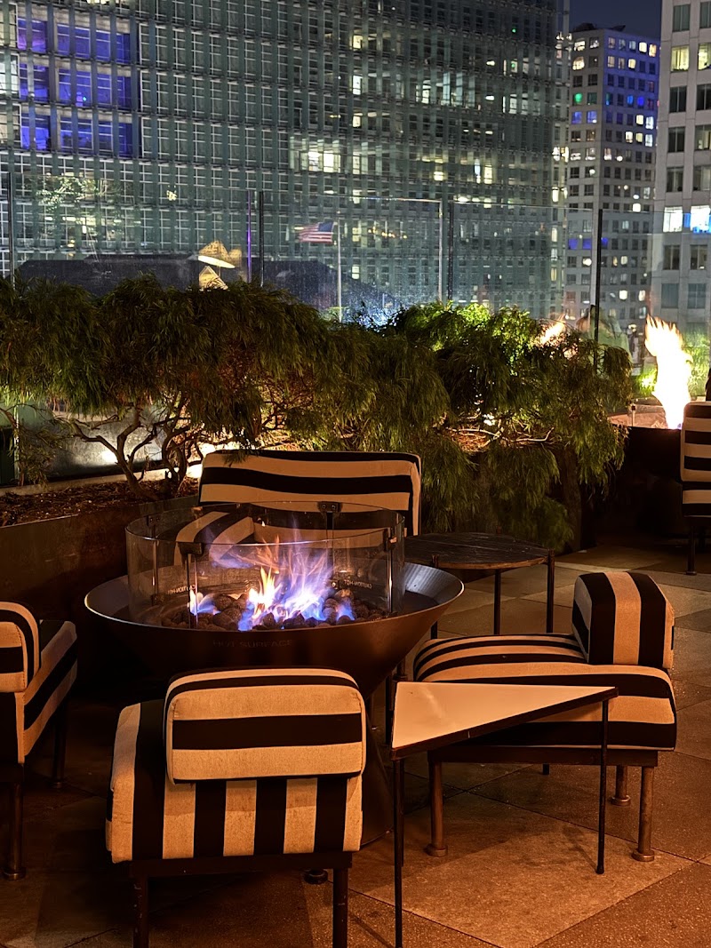Fire pit seating, city lights