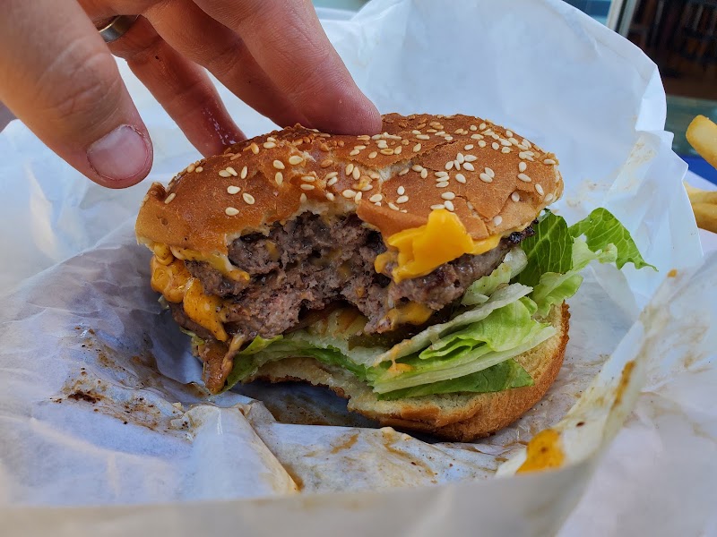 Juicy cheeseburger, first bite