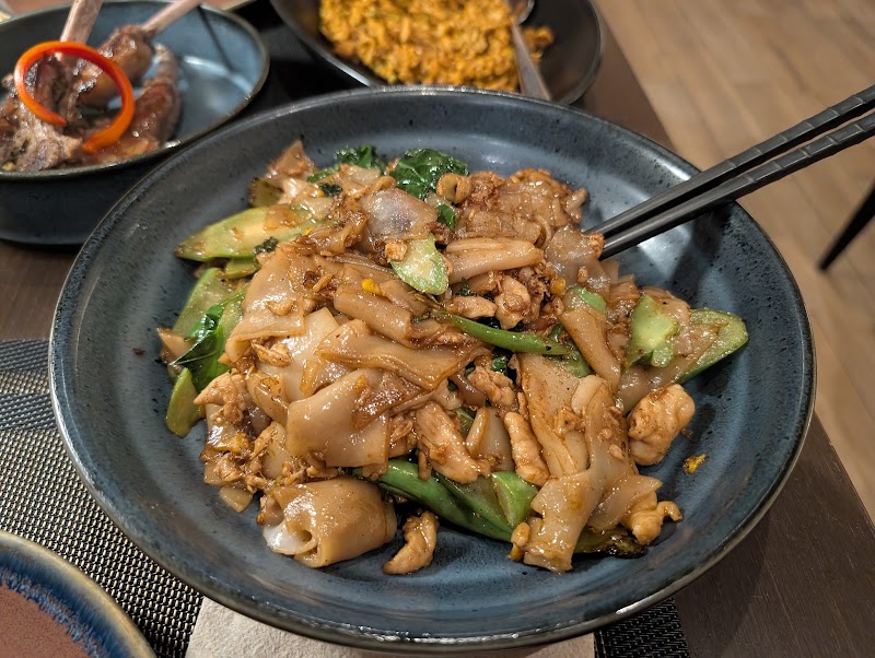Wok-tossed noodles, bold sauce