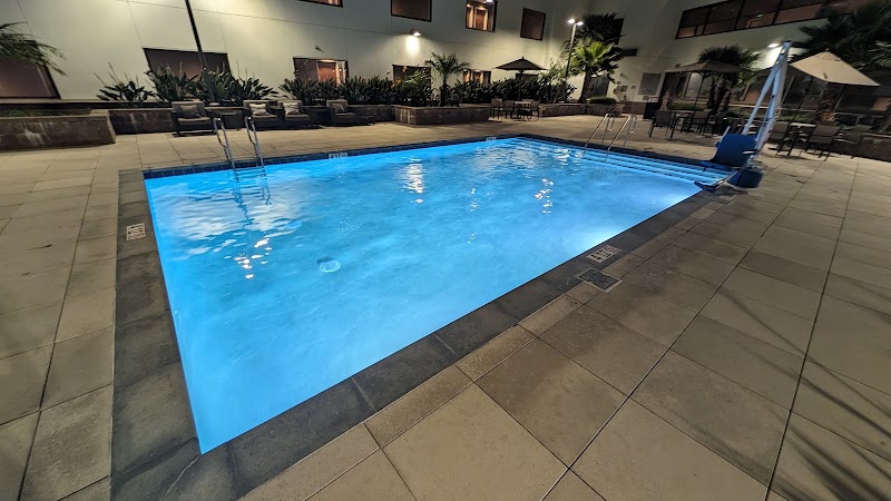 Glowing poolside evening escape