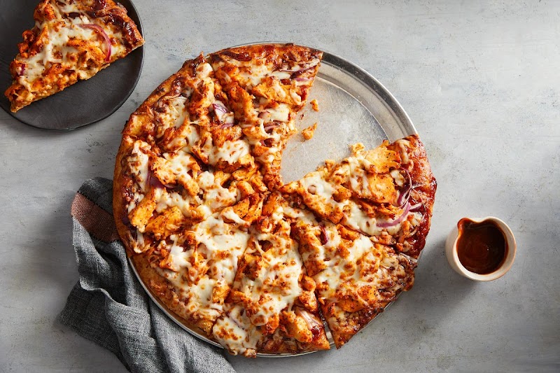 Butter chicken pizza, loaded