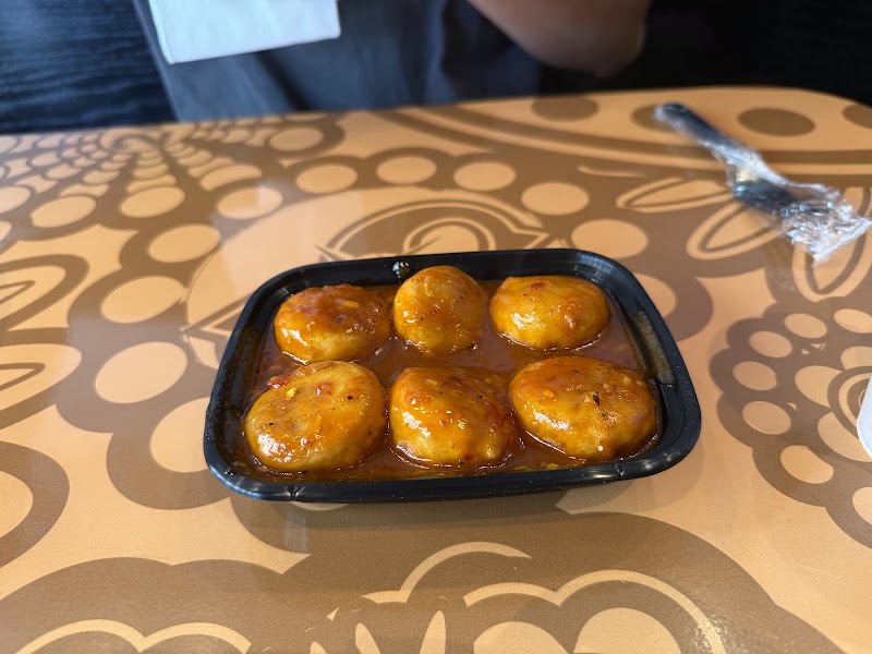 Butter veggie momos, sauced