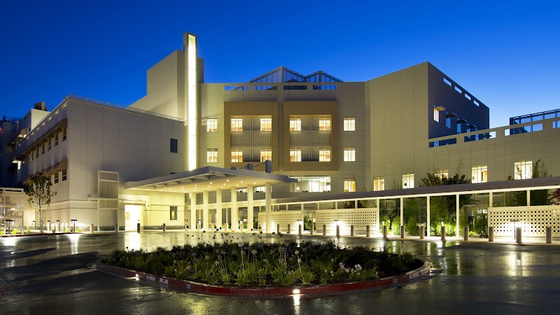 Hospital lit at dusk