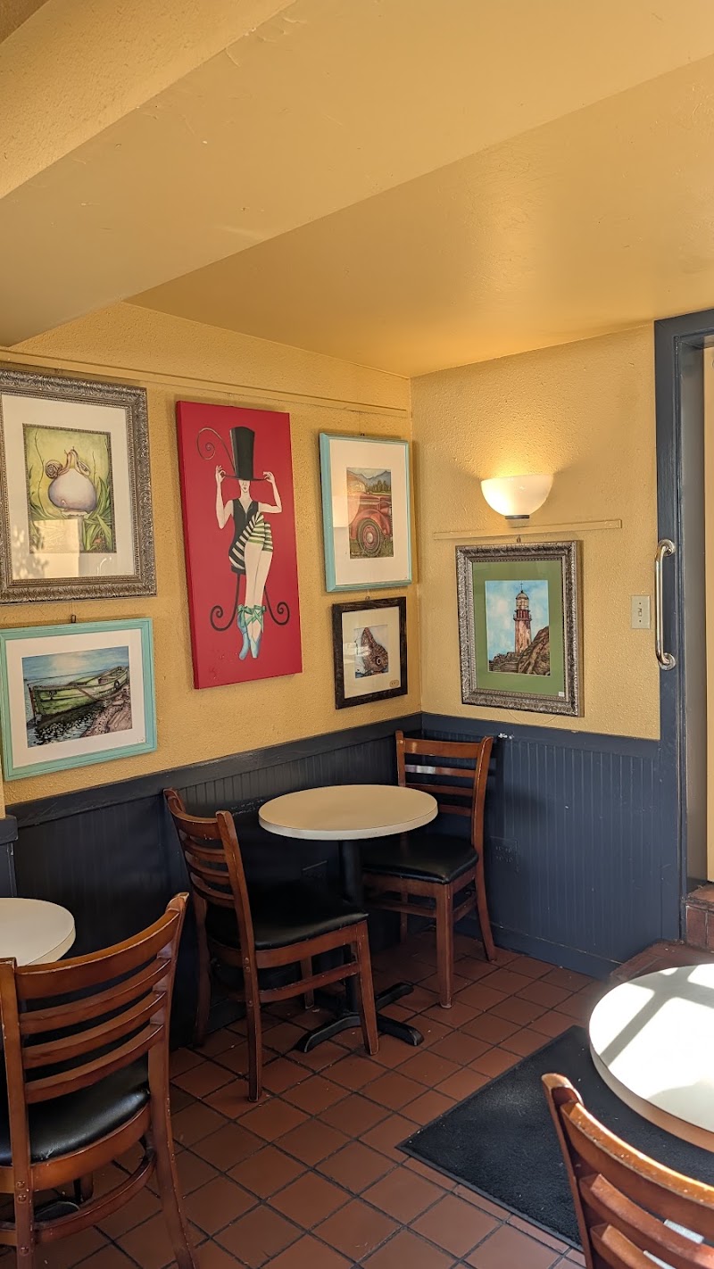 Cozy art-lined seating nook