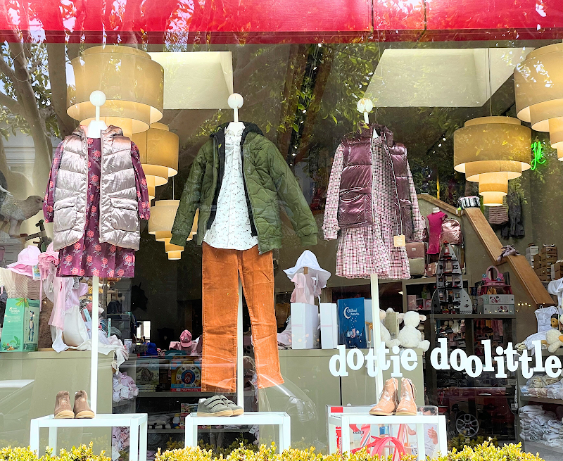 Colorful kids outfits displayed