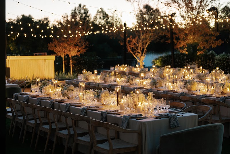 Candlelit outdoor reception tables