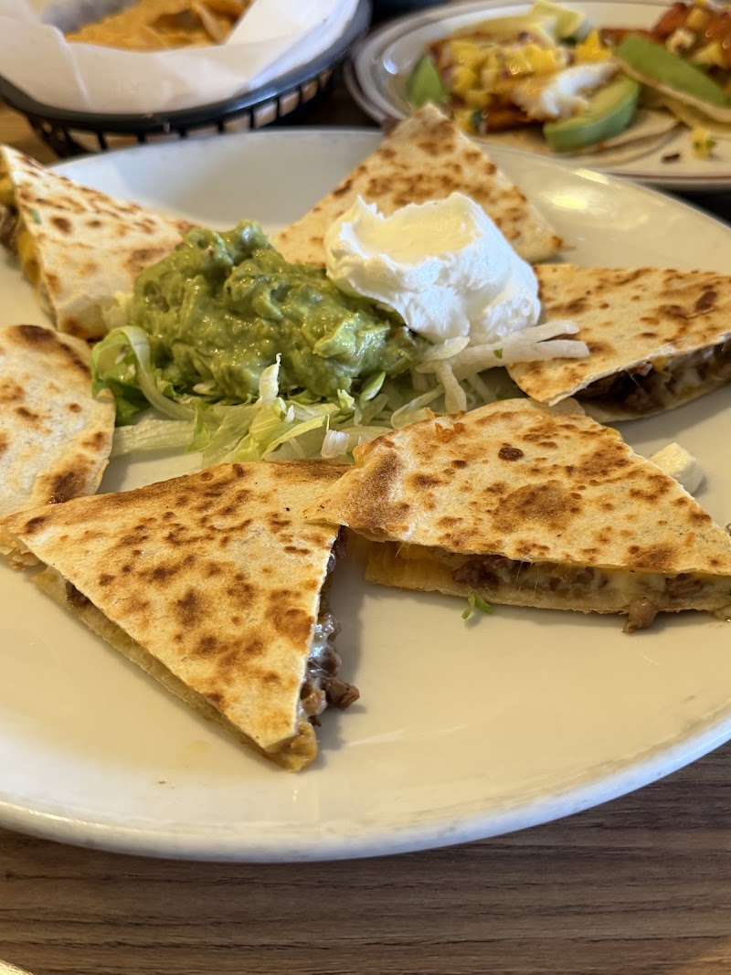 Quesadilla with guacamole and cream