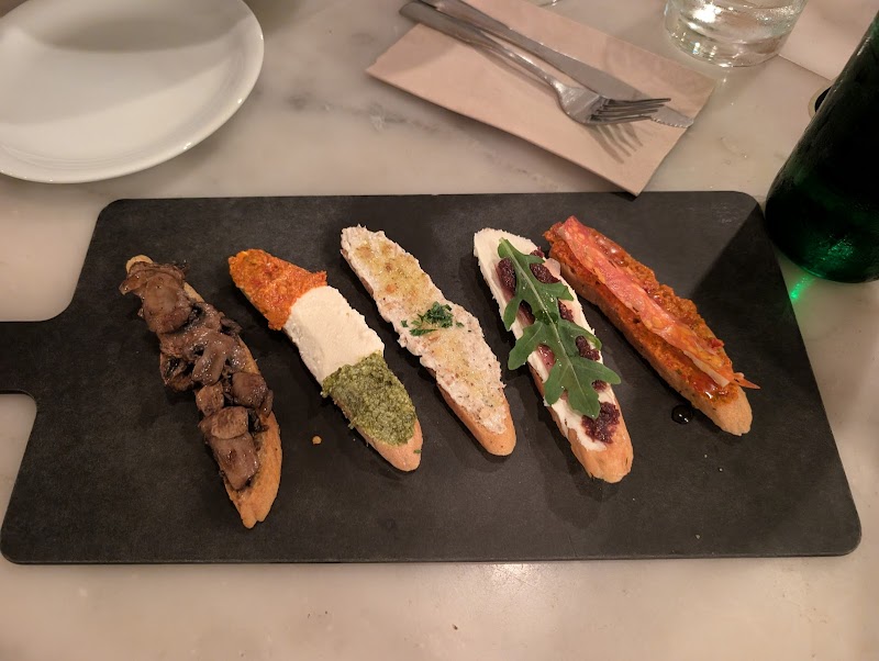 Five-topping bruschetta sampler board