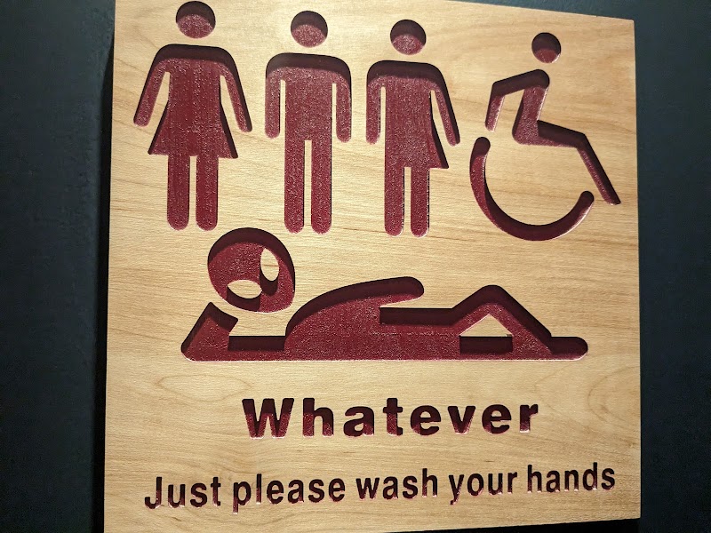 Inclusive, welcoming restroom signage