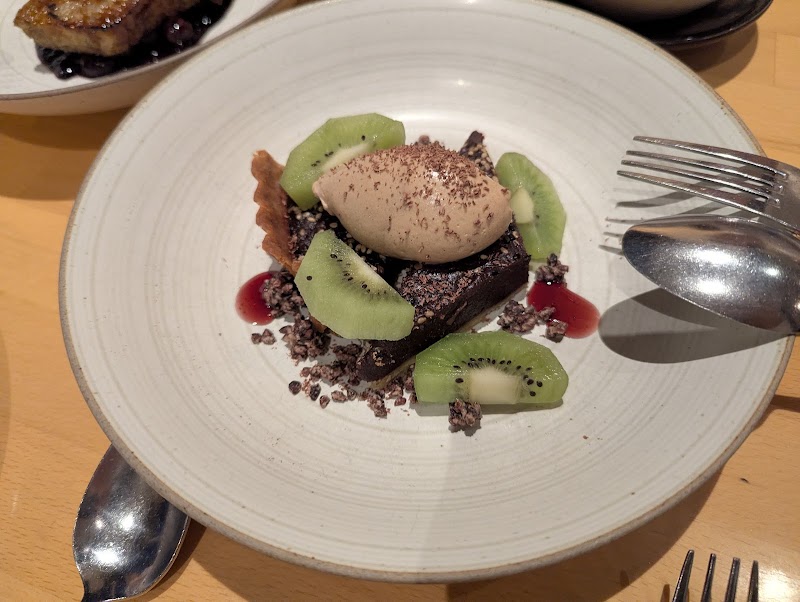 Chocolate tart, kiwi garnish