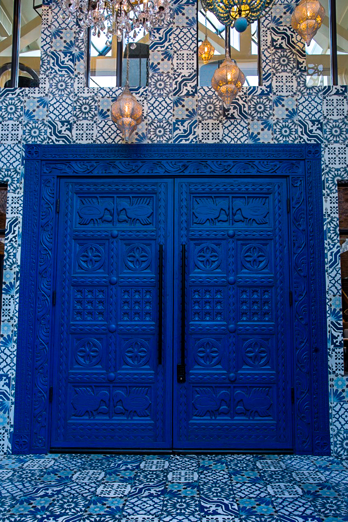 Hand-carved blue entry doors