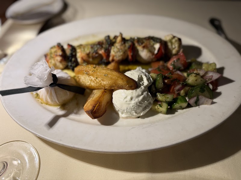 Herb-grilled skewers, tzatziki, salad