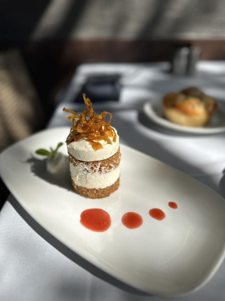 Elegant layered dessert, artful finish