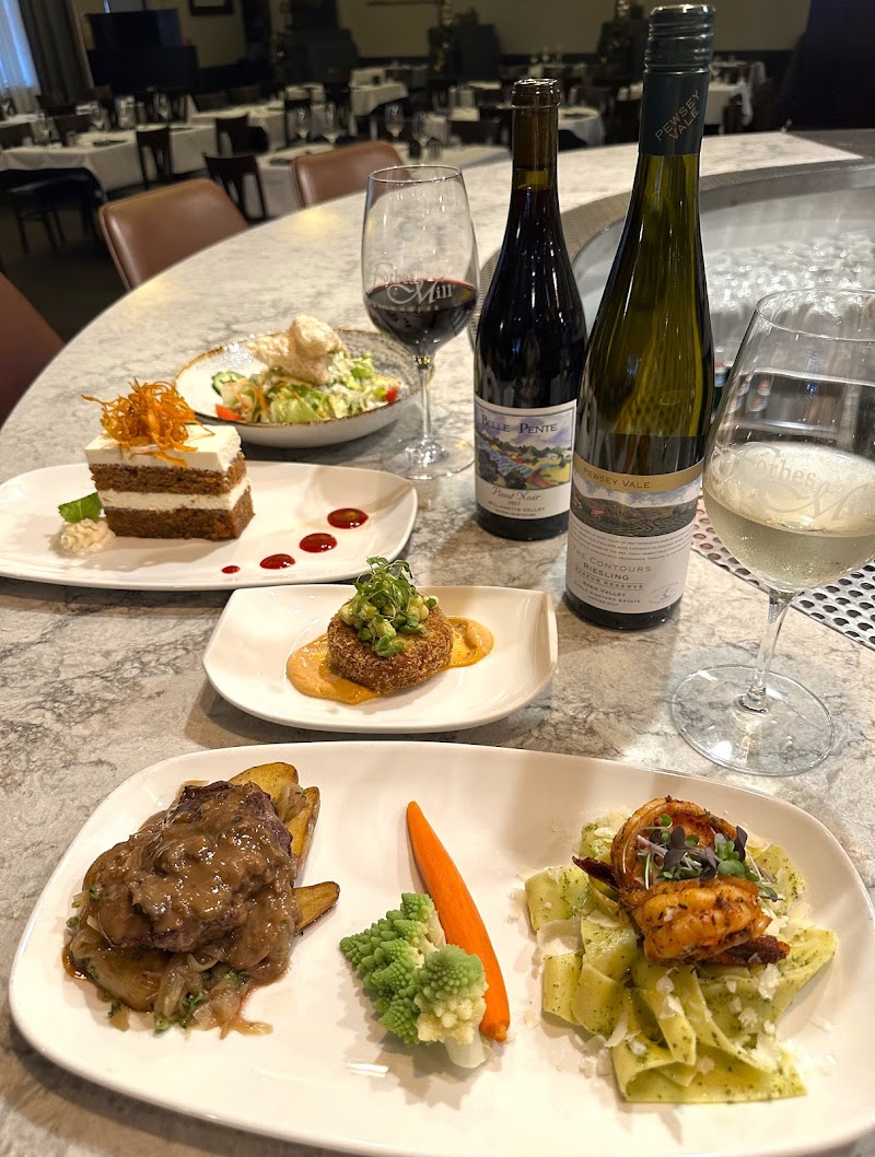 Elegant spread of dishes and wine