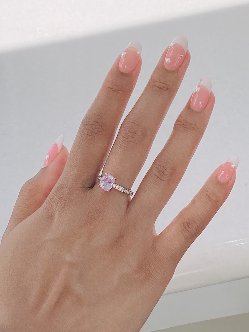 Lavender sapphire engagement ring worn