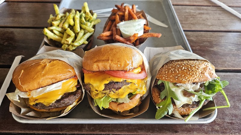 Burgers, fries, tray full