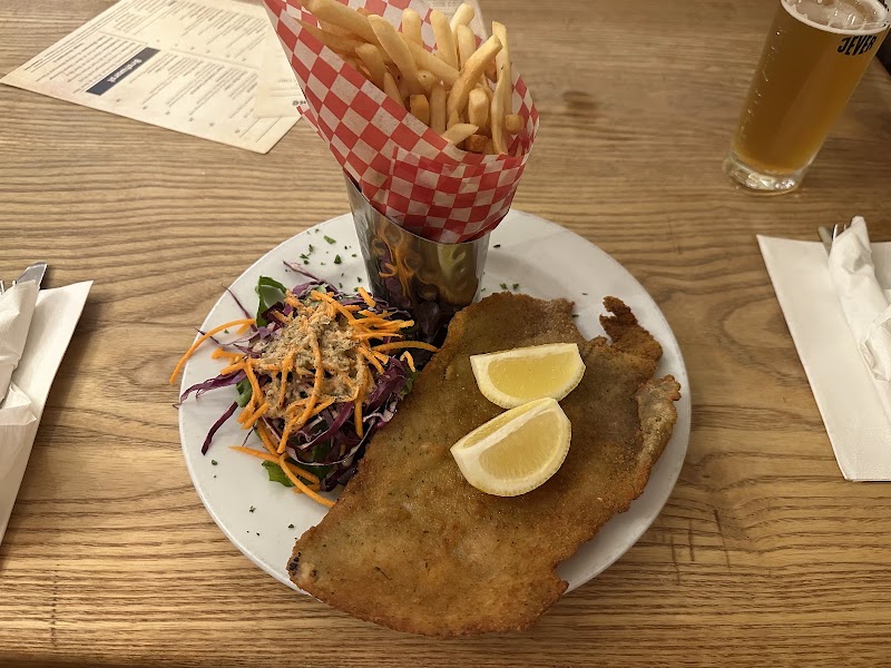 Schnitzel with fries, served