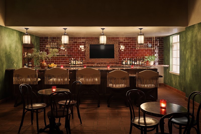Candlelit bar, warm brick backdrop