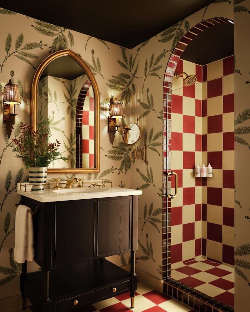 Richly tiled shower, warm details