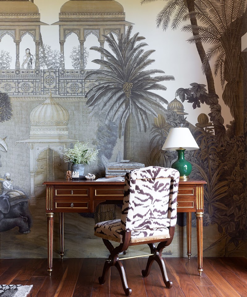 Dramatic mural, curated desk vignette