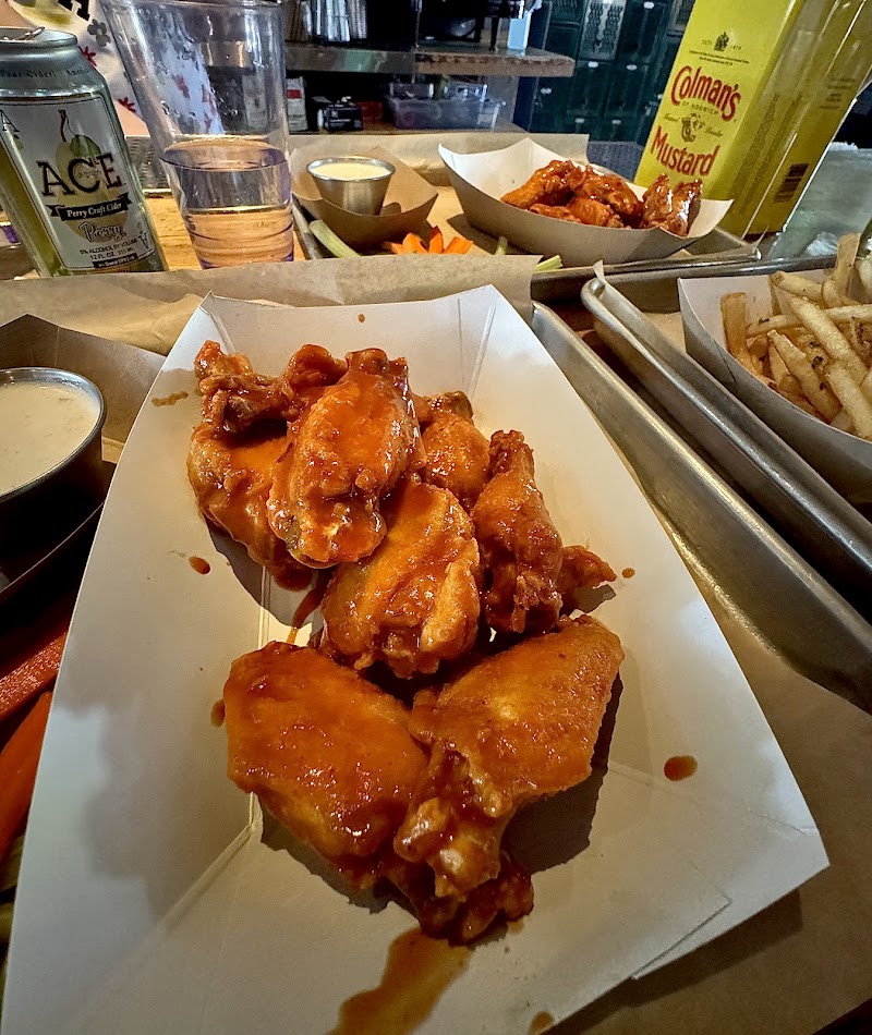 Saucy wings at the bar