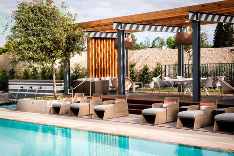 Shaded poolside seating area