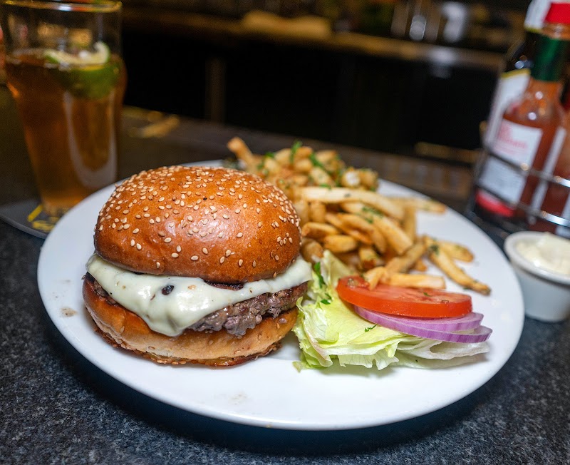 Juicy cheeseburger with seasoned fries