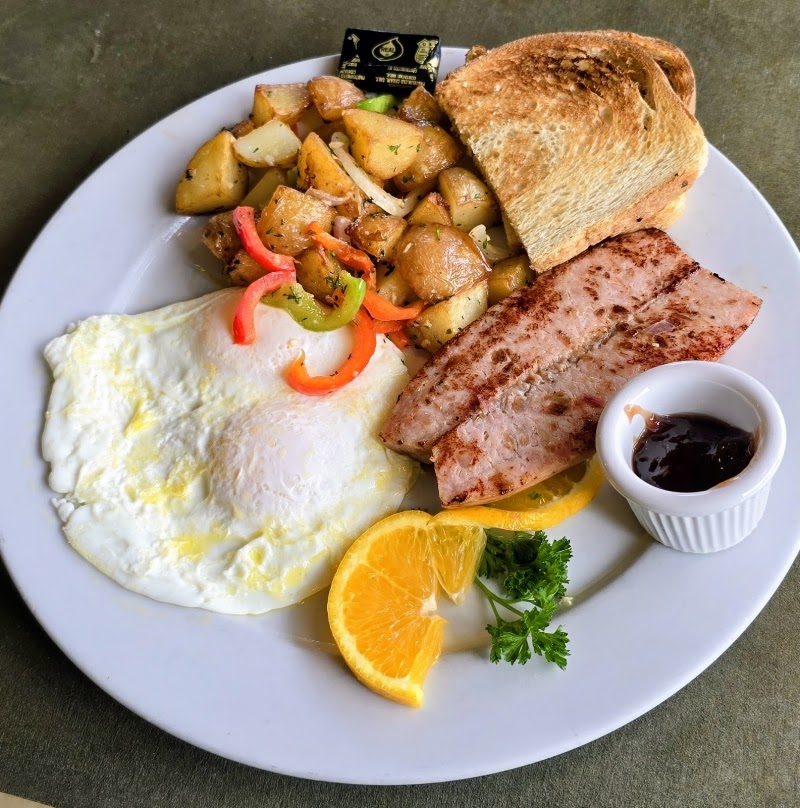 Hearty breakfast plate, fresh sides